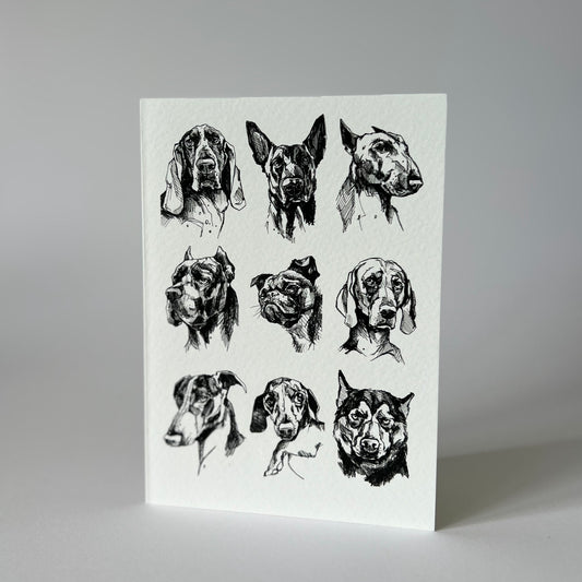 Naughty little dogs greetings card