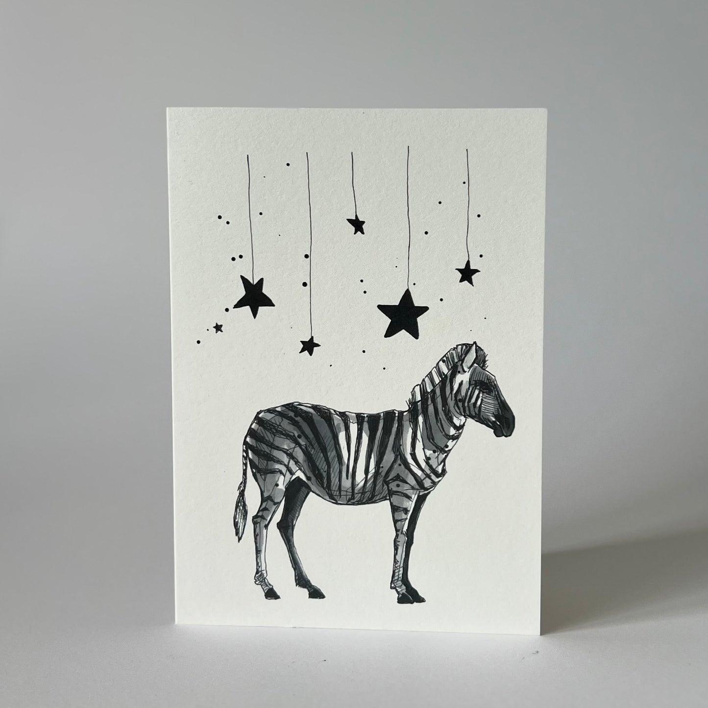'Zebra + stars' greetings card